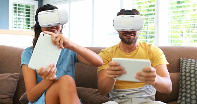 Happy Couple Playing Active VR Games on the Couch - Download Free Stock Images Pikwizard.com