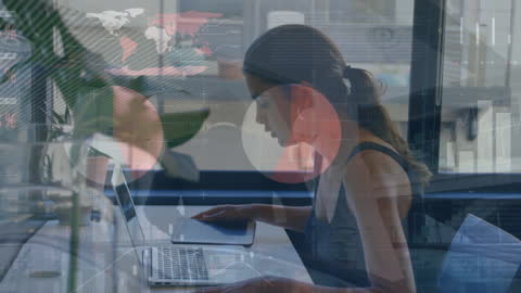 Businesswoman Analyzing Data on Laptop in Futuristic Office Setting