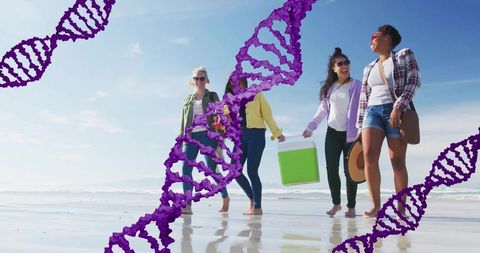 Friends walking barefoot on sunny beach carrying cooler and hat with purple dna overlay