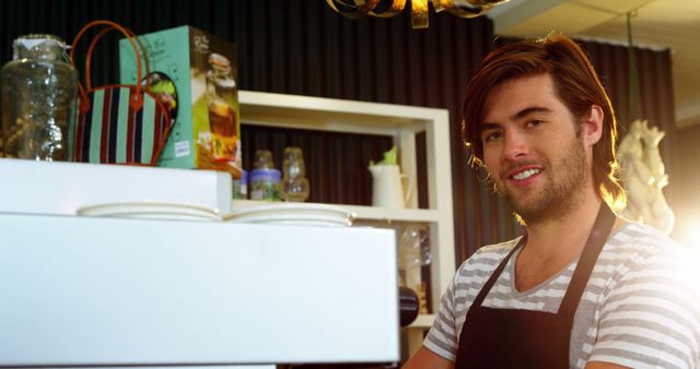 Happy Barista Man Working in Cafeteria - Download Free Stock Images Pikwizard.com