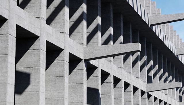 Brutalist Concrete Facade Casting Dramatic Shadows and Geometric Grid Pattern
