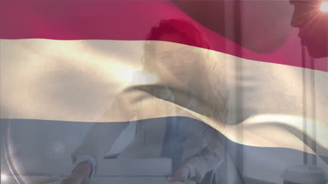 Diverse Architects Collaborating with Netherlands Flag Overlay