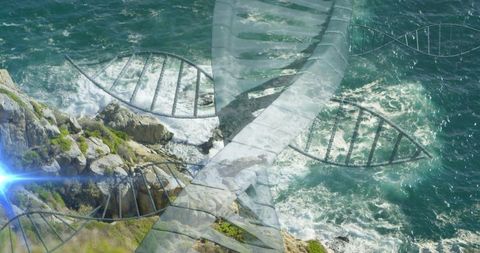 Translucent dna helix overlaying rugged coastline with crashing waves and lens flare