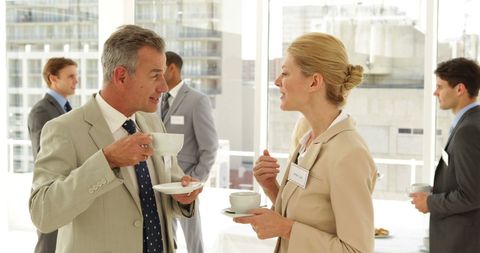 Business Professionals Networking at Conference Event