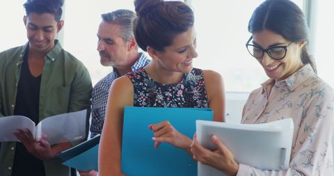 Diverse Professional Team Sharing Ideas in Office - Download Free Stock Images Pikwizard.com