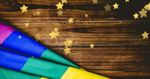 Rainbow Flag and Golden Stars on Rustic Wooden Background - Download Free Stock Images Pikwizard.com