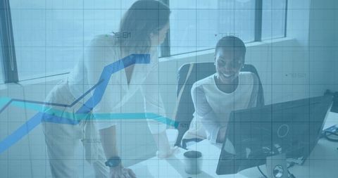 Coworkers Analyzing Data with Digital Graph Overlay in Modern Office