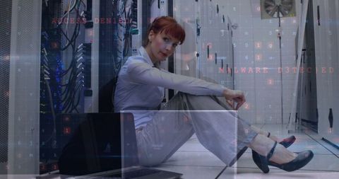 Businesswoman in Server Room with Data Overlay Visualization
