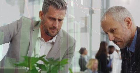 Business Professionals Analyzing Finance Data Over Digital Visualization