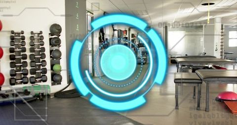 Displaying cyan AR circular HUD overlaying rehab gym with dumbbell rack benches