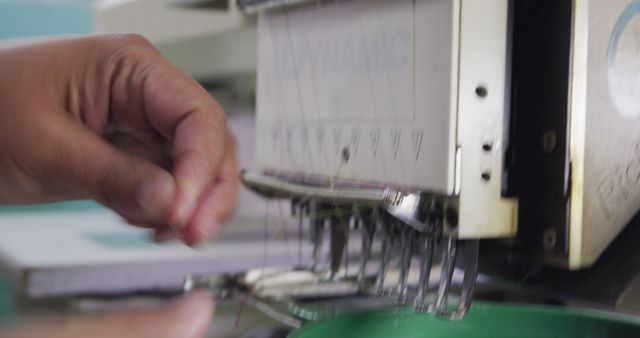 Close-Up of Person Operating Industrial Sewing Machine - Download Free Stock Images Pikwizard.com