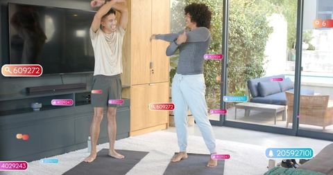 Two men stretching in bright living room with augmented reality fitness overlays