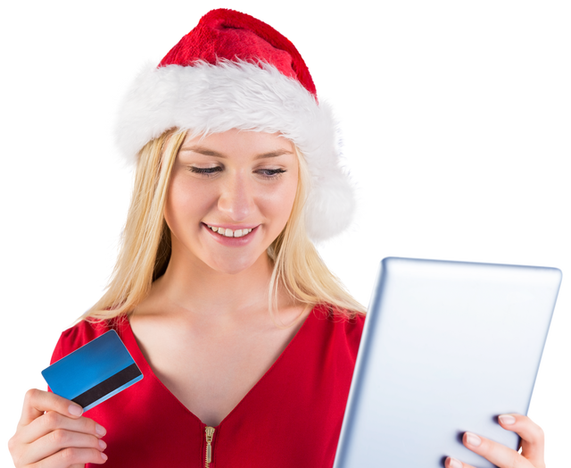 Festive woman with Santa hat using tablet for online shopping - Download Free Stock Videos Pikwizard.com