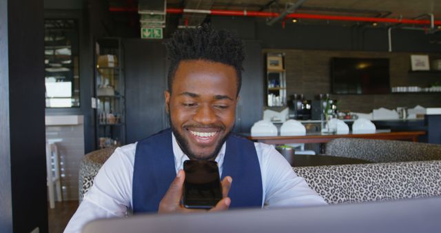 Smiling Businessman Using Smartphone in Office Café - Download Free Stock Images Pikwizard.com