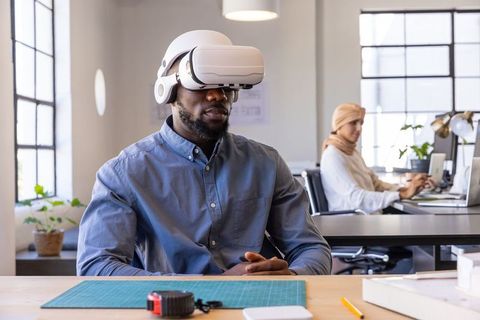 Diverse Colleagues Embracing Virtual Reality for Innovative Work Solutions