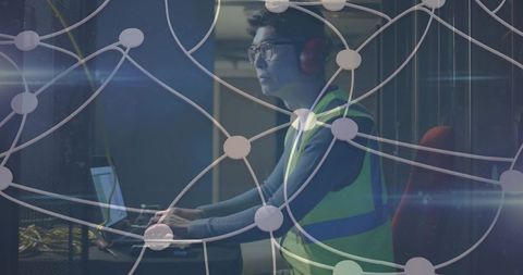 Technician engaged in data center maintenance with network overlay