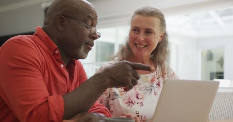 Happy Senior Couple Using Laptop in Modern Living Room - Download Free Stock Images Pikwizard.com