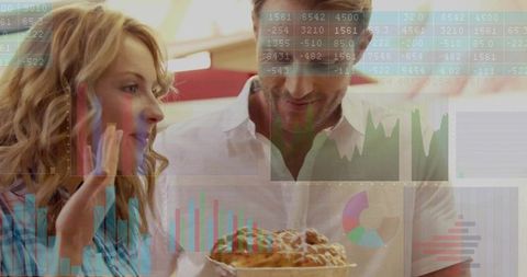 Couple choosing bakery pastries amid business analytics overlay showing sales trends