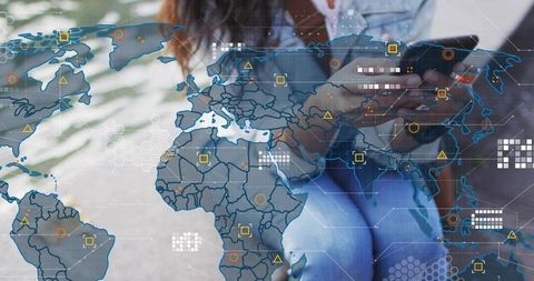 Woman holding smartphone and tablet viewing global data map overlay for mobile analytics