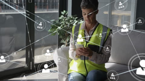 Senior Female Engineer Networking in Modern Office Environment