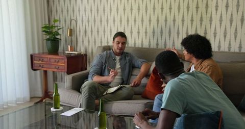 Friends Relaxing with Drinks in Cozy Living Room