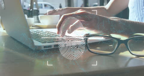 Businesswoman Using Laptop in Cafe with Digital Interface Overlay