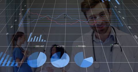 Male doctor analyzing healthcare data with digital charts