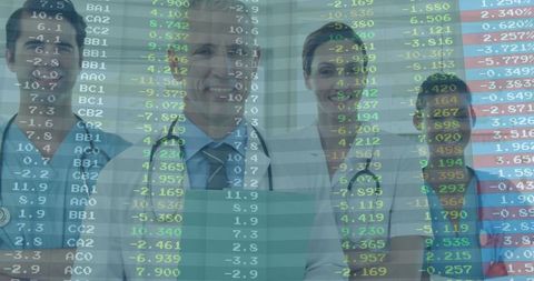 Medical Team Analyzing Financial Data in Clinic Environment