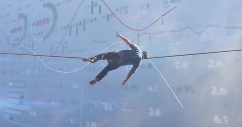 Man balancing on high slackline above market charts conceptual risk and balance