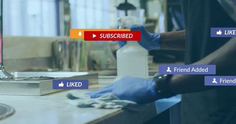 Man Wearing Gloves Cleaning Kitchen Countertop with Social Media Icons
