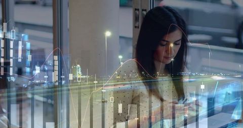 Businesswoman using smartphone with data overlay in modern office
