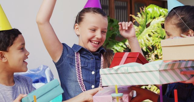 Children Celebrating Birthday with Gifts and Party Hats - Download Free Stock Images Pikwizard.com