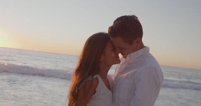 Joyful Young Couple Dancing on Beach at Sunset, Summer Romance by the Sea - Download Free Stock Images Pikwizard.com