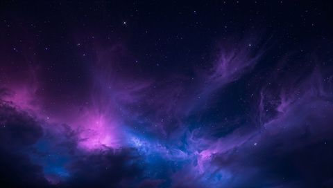 Iridescent Nebula Clouds Stretching Across Deep Space with Stars and Cosmic Dust