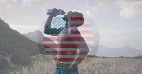 Silhouette of Man Drinking Water with American Flag Overlay