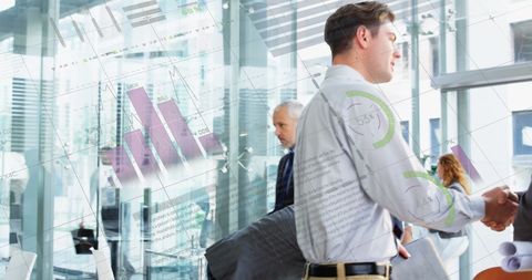 Business Team Discussing Data and Analytics in Modern Office