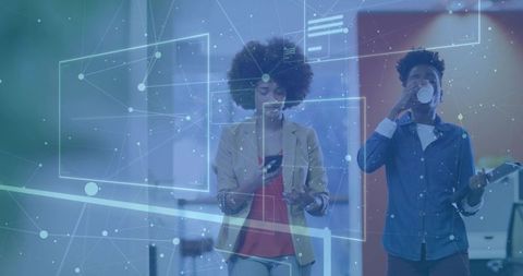 Coworkers Interacting with Digital Overlays in Modern Office