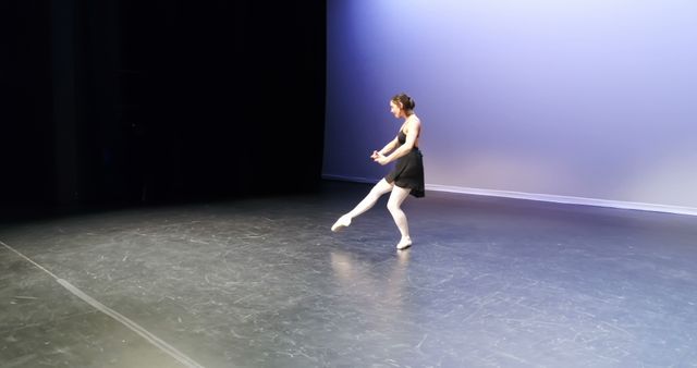 Ballet Dancer Performing on Stage in Elegant Pose - Download Free Stock Images Pikwizard.com