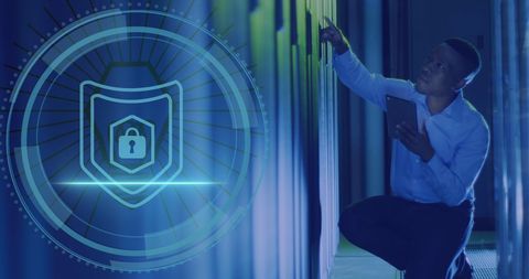 Cybersecurity technician in data center ensuring server protection