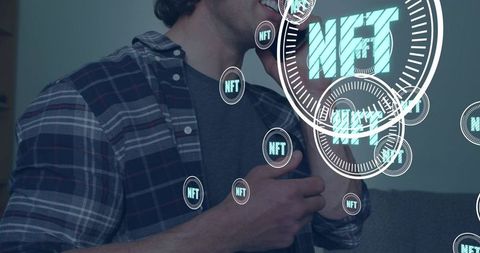 Talking man holding phone touching chest with floating NFT token graphics at home interior