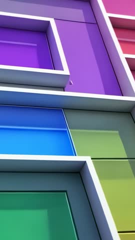 Vertical panning over white partition grid revealing vibrant geometric color gradient