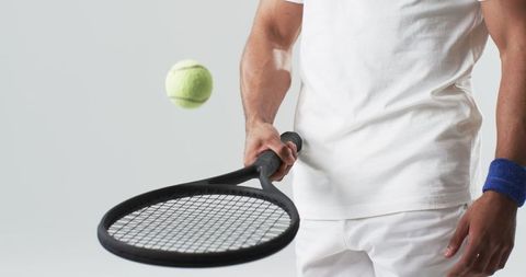 Tennis player hitting ball with precision and focus in action shot