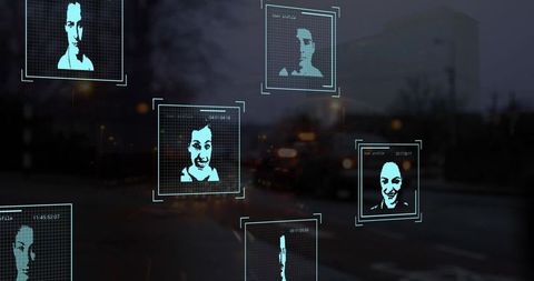 Facial Recognition Technology Over City Street at Night