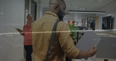 Professional in modern office reviewing documents