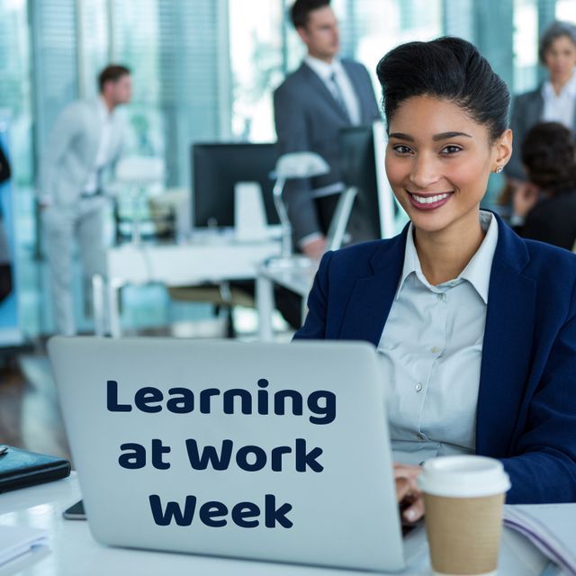 Confident businesswoman with laptop promoting Learning at Work Week, perfect for articles on company training programs, professional growth initiatives, corporate learning events, or office culture enhancement materials.
