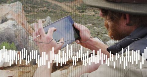 Hiker Using Tablet for Data Analysis in Mountainous Terrain - Download Free Stock Images Pikwizard.com