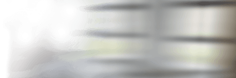 Abstract transparent patterned glass windows in office