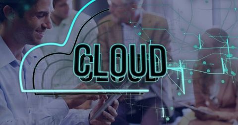 Cloud Collaboration in Office Boardroom Showing Neon CLOUD Wordmark and Mobile Devices