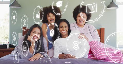 Diverse Women Relaxing with Futuristic Tech and Education Icons
