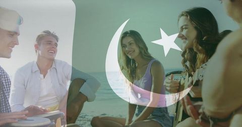Vibrant Young Friends Making Music at Beach With Flag Overlay